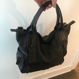 Fossil black satchel